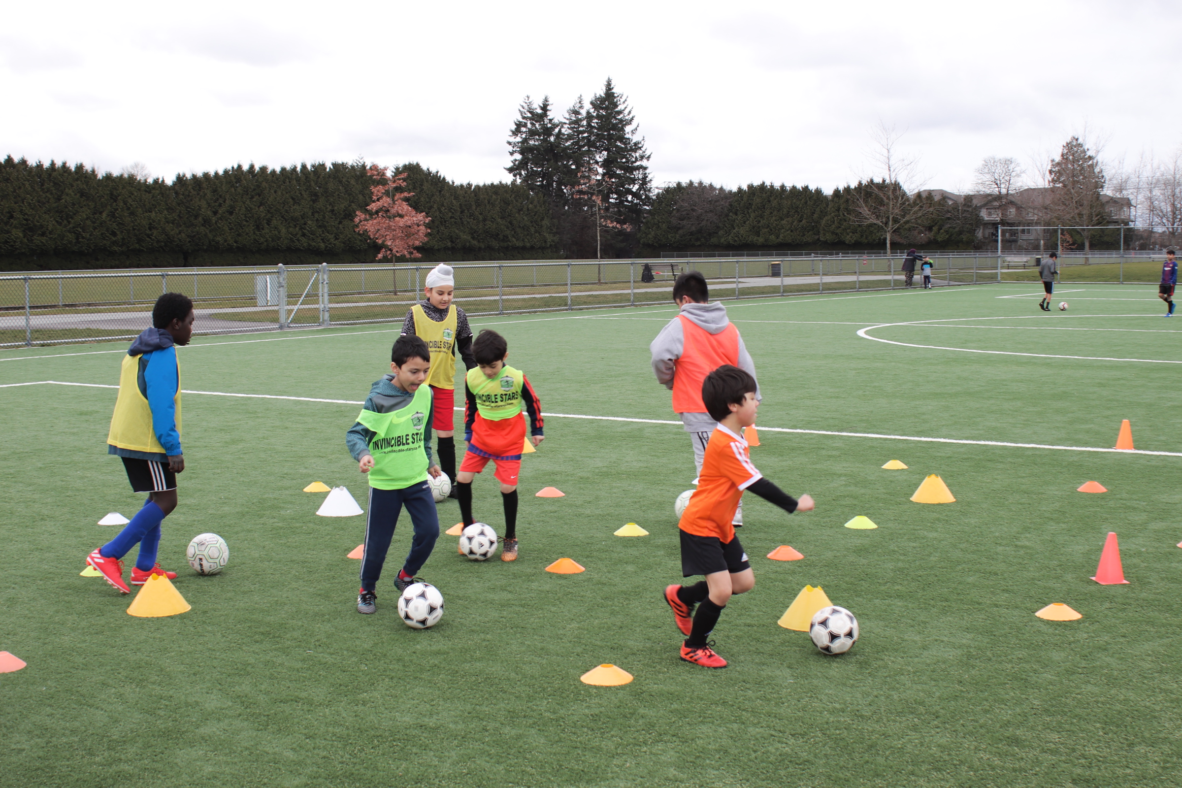 Kids kneeling in Soccer